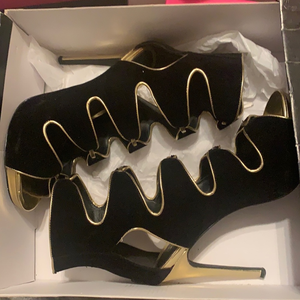 Black and gold heels
